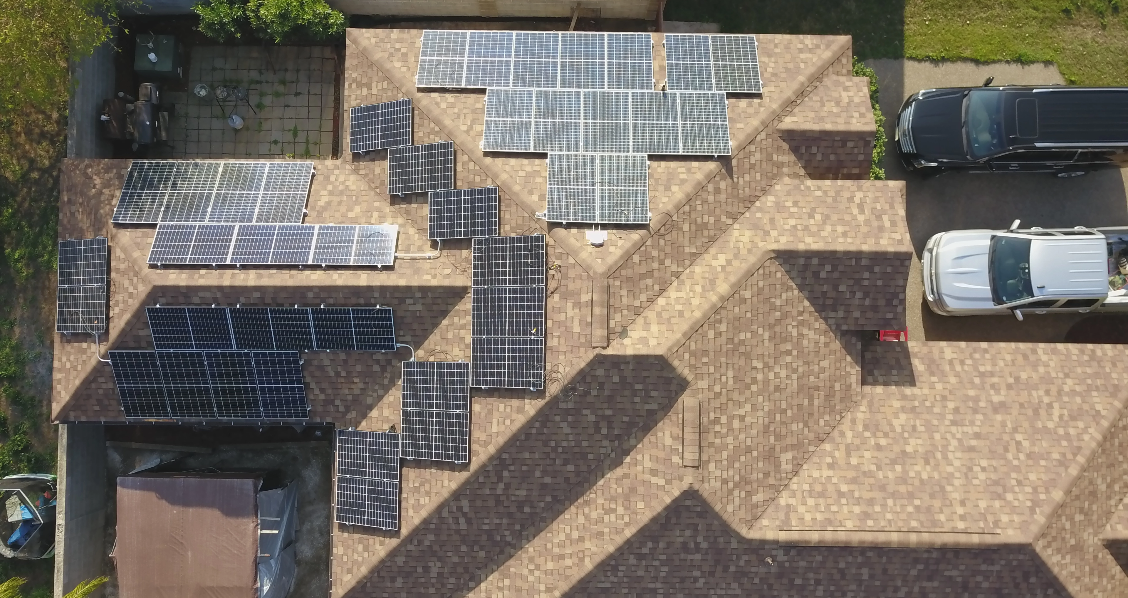 Home in South Texas equipped with solar panels on the roof, provided by PEG Energy, showcasing renewable energy solutions.